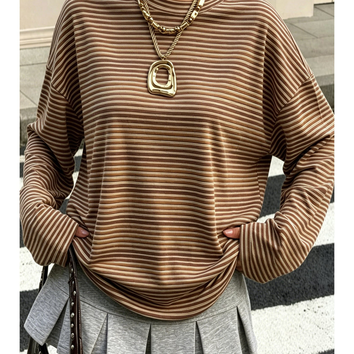 Top grande taille à rayures, coupe oversize, manches longues — matière : polyester Image