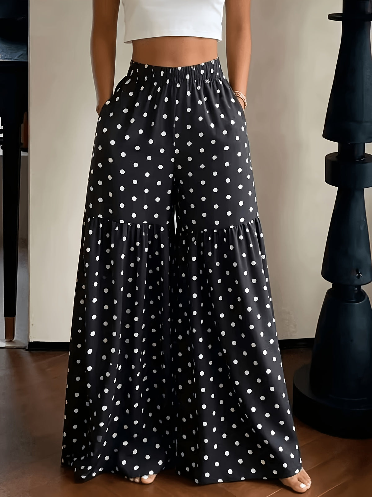 Pantalon grande taille à pois, coupe évasée, poches pratiques, visuel produit