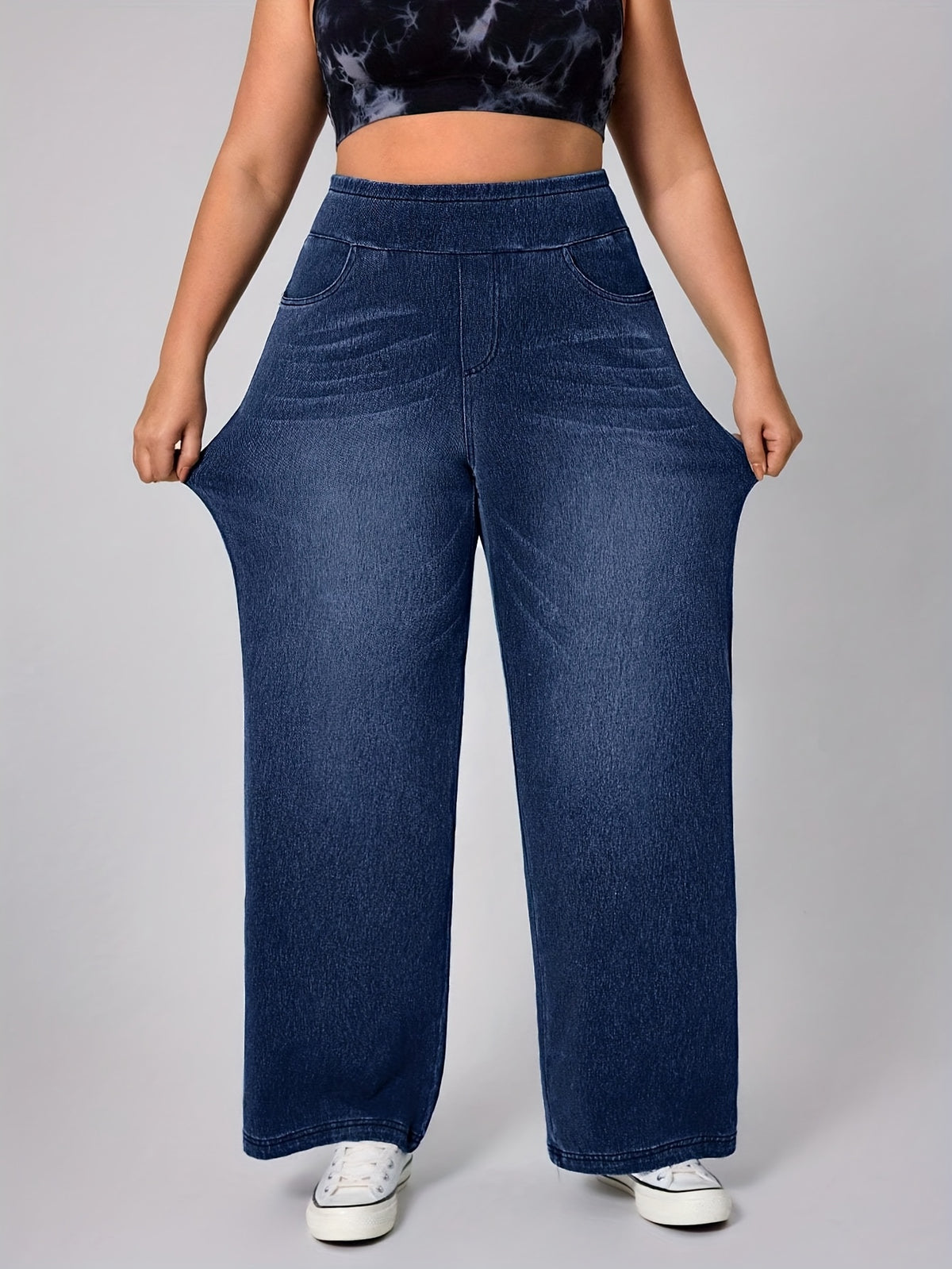 Pantalon grande taille, coupe droite, poches pratiques, toucher naturel, détail du col