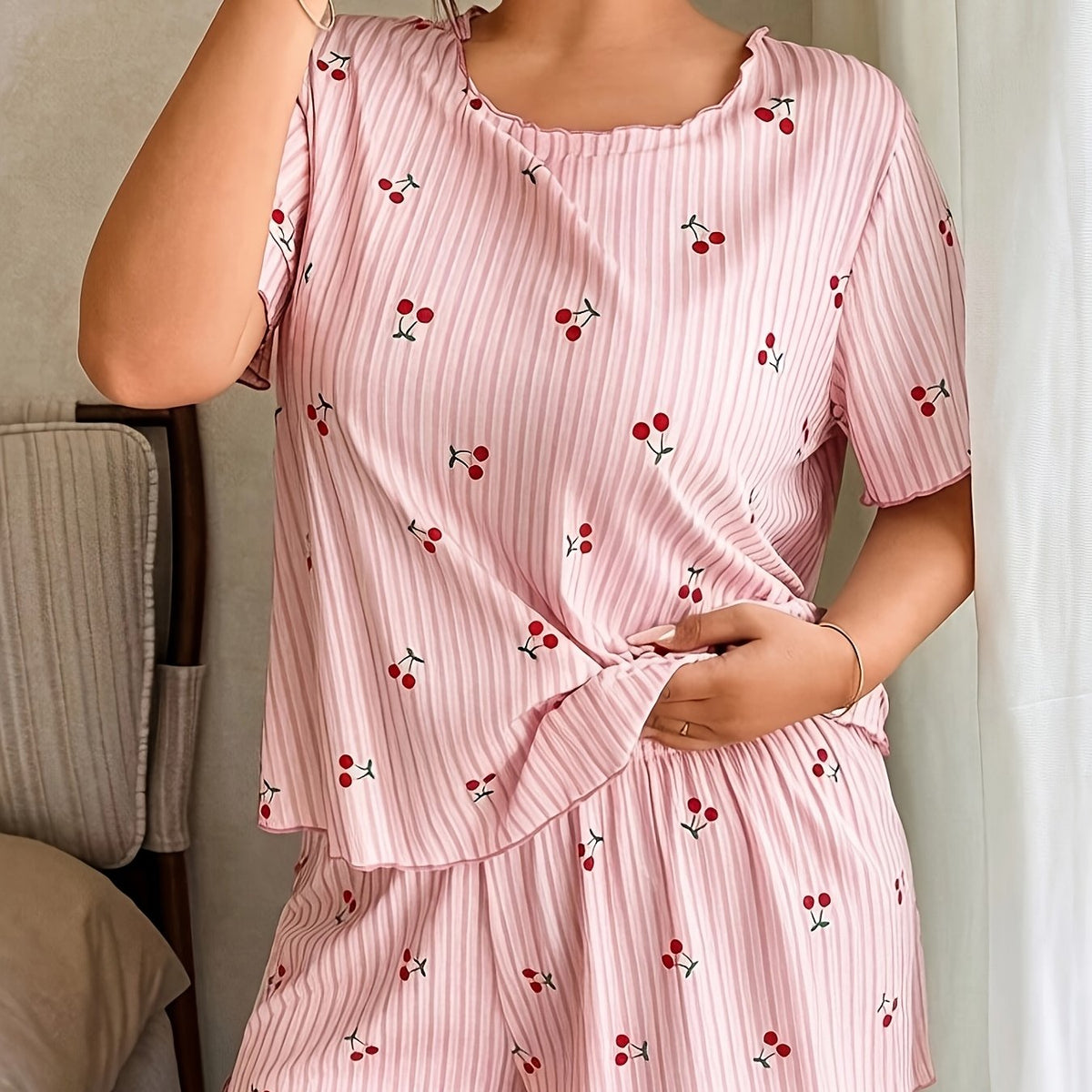 Ensemble grande taille, coupe ample, manches courtes, esprit décontracté — composition : 100% Polyester Image
