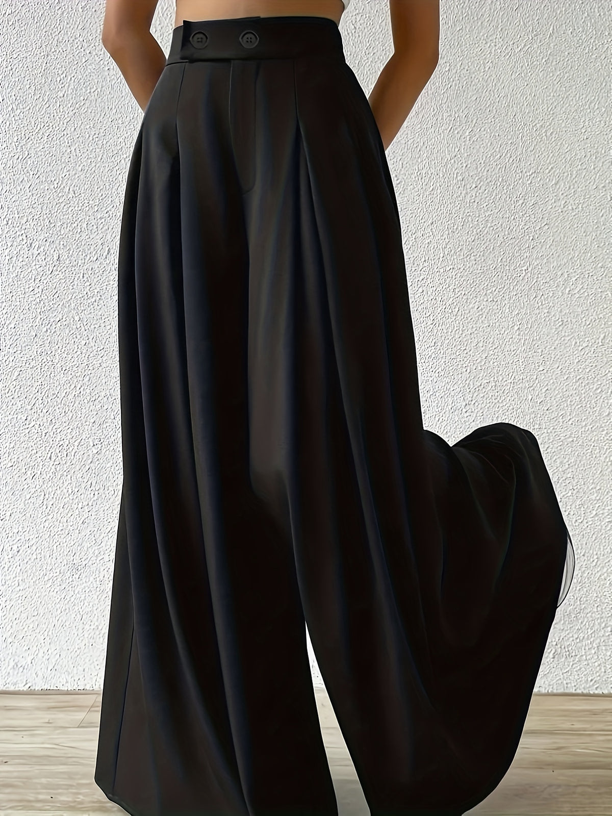 Pantalon grande taille, coupe ample, jambe large, allure élégante