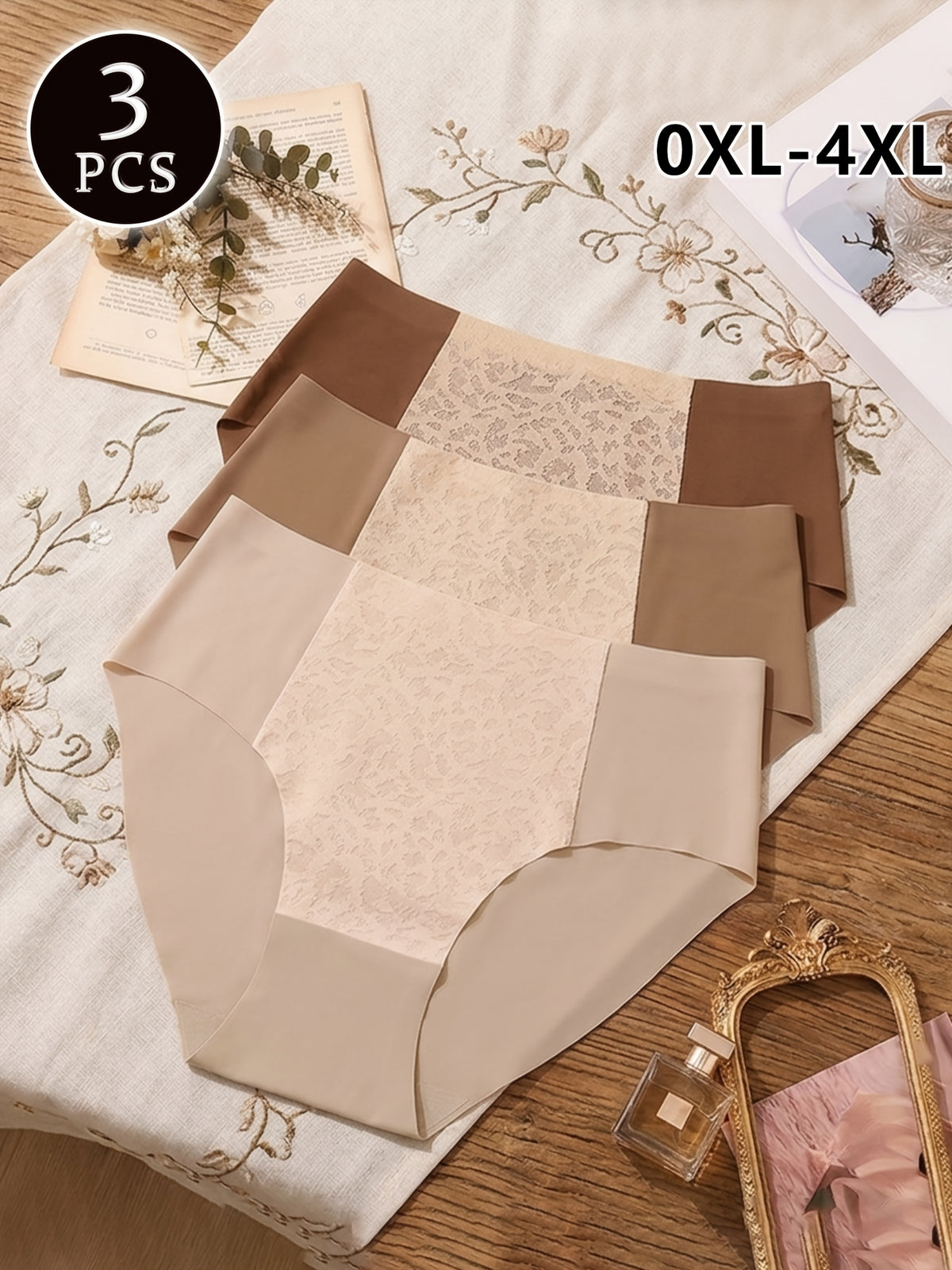 Culotte grande taille en dentelle, broderie, effet ajouré — composition : 85% Polyamide, 15% Élasthanne Image