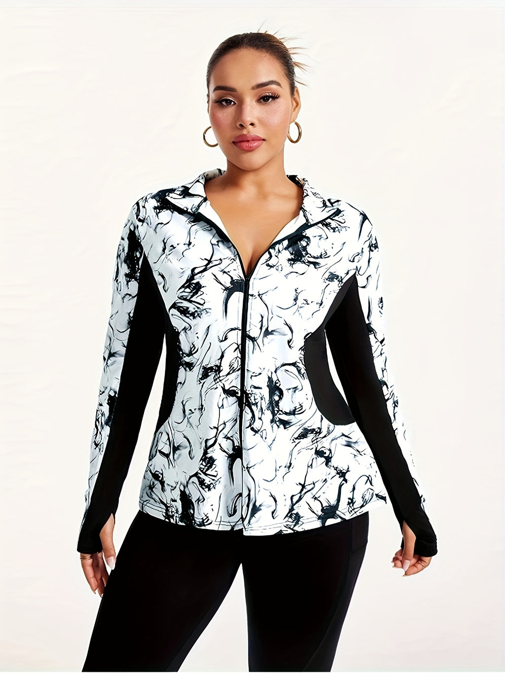 Veste grande taille, coupe oversize, manches longues, détail du tissu