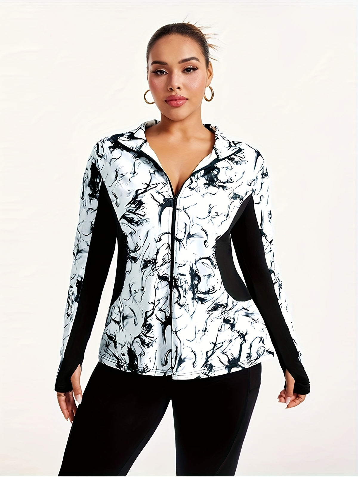 Veste grande taille, coupe oversize, manches longues, détail du tissu