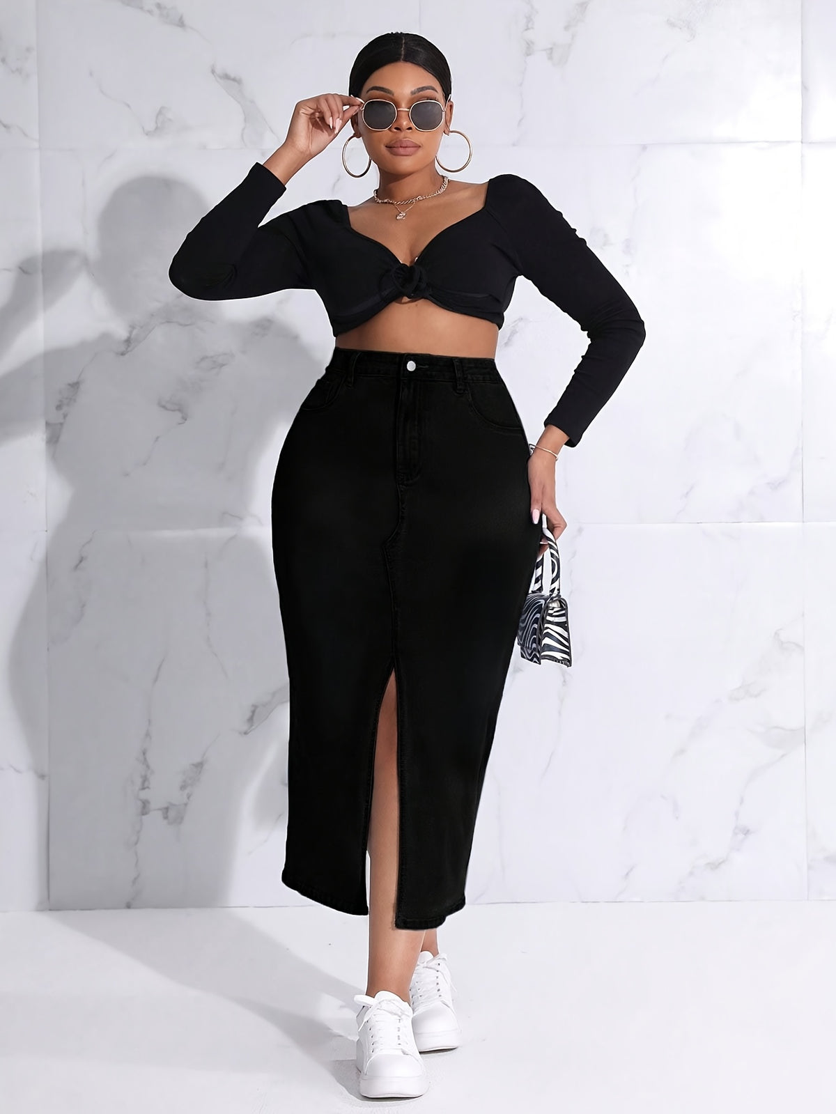 Jupe grande taille, coupe oversize, fente latérale, tenue franche
