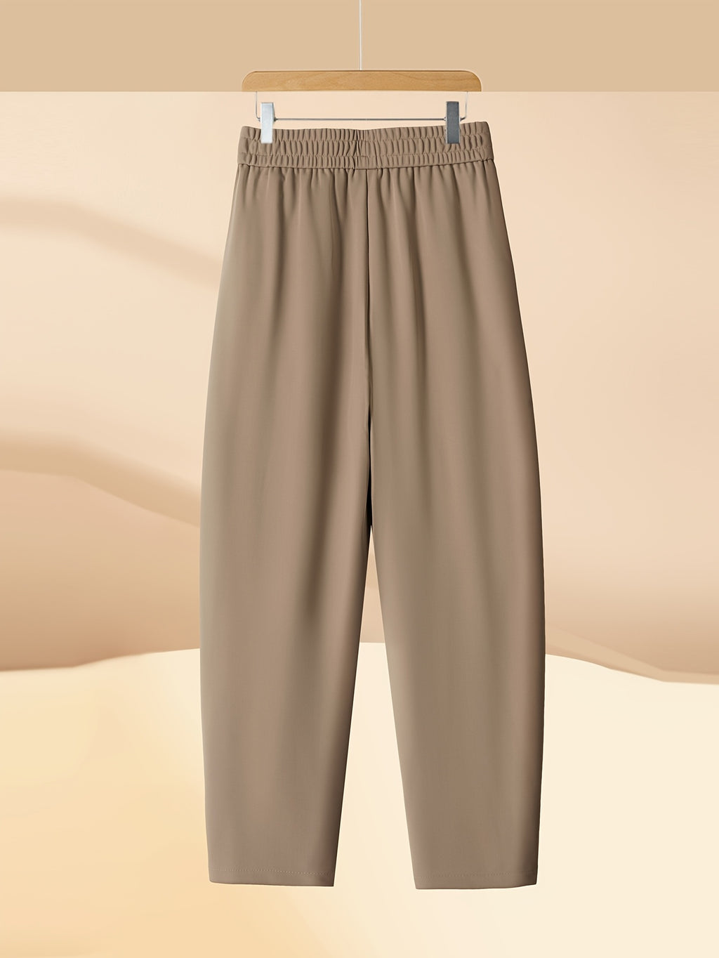 Pantalon carotte grande taille — Maille drapée et plis creux