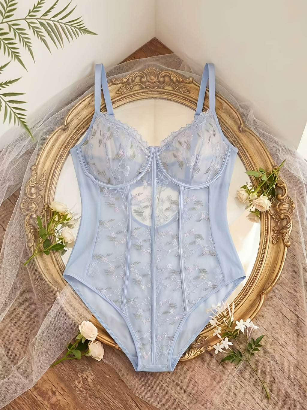 Body gainant grande taille à imprimé fleuri, ligne affirmée, détail du tissu