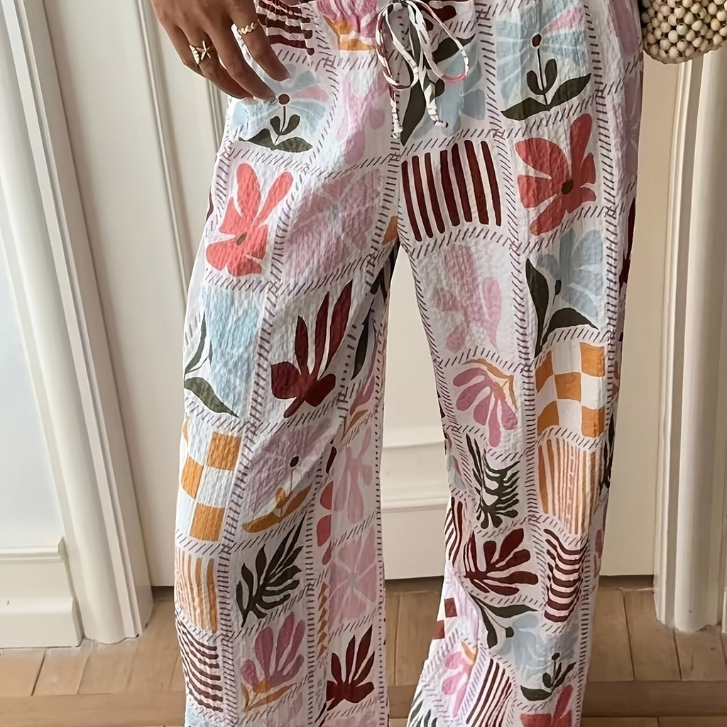 Pantalon grande taille à imprimé fleuri, coupe évasée, cordon de serrage — matière : polyester