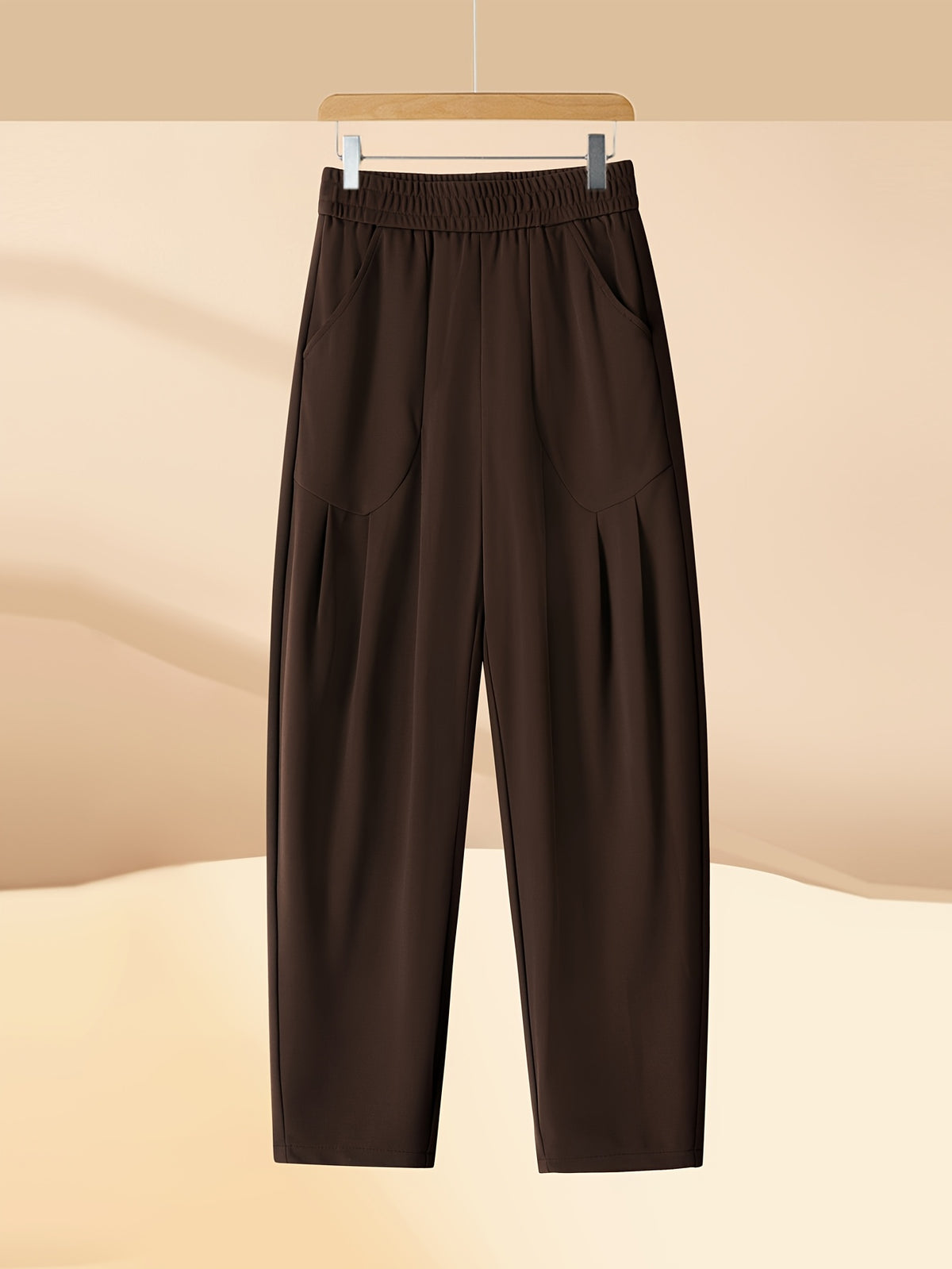 Pantalon carotte grande taille — Maille drapée et plis creux