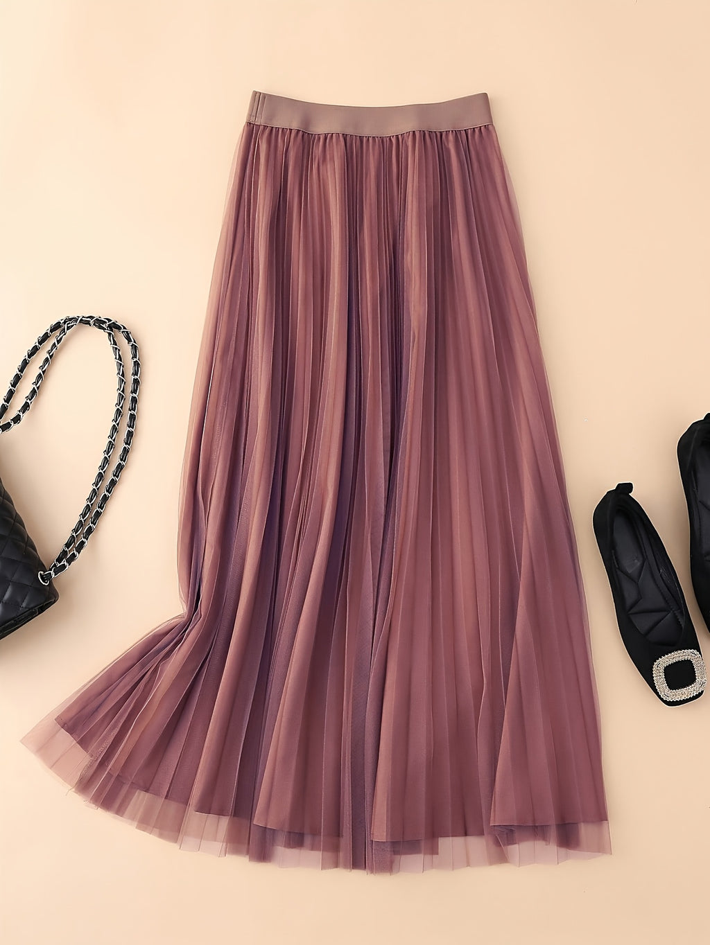 Jupe grande taille, plissés, allure élégante, porté de face