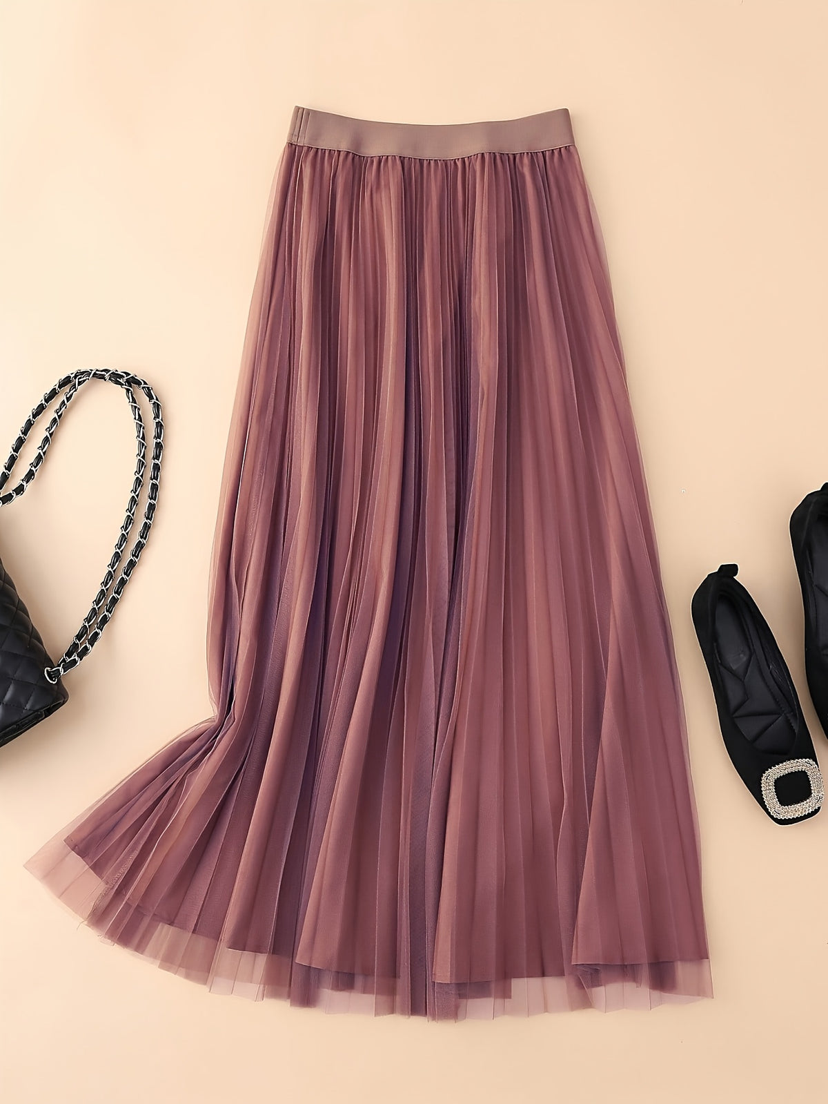 Jupe grande taille, plissés, allure élégante, porté de face