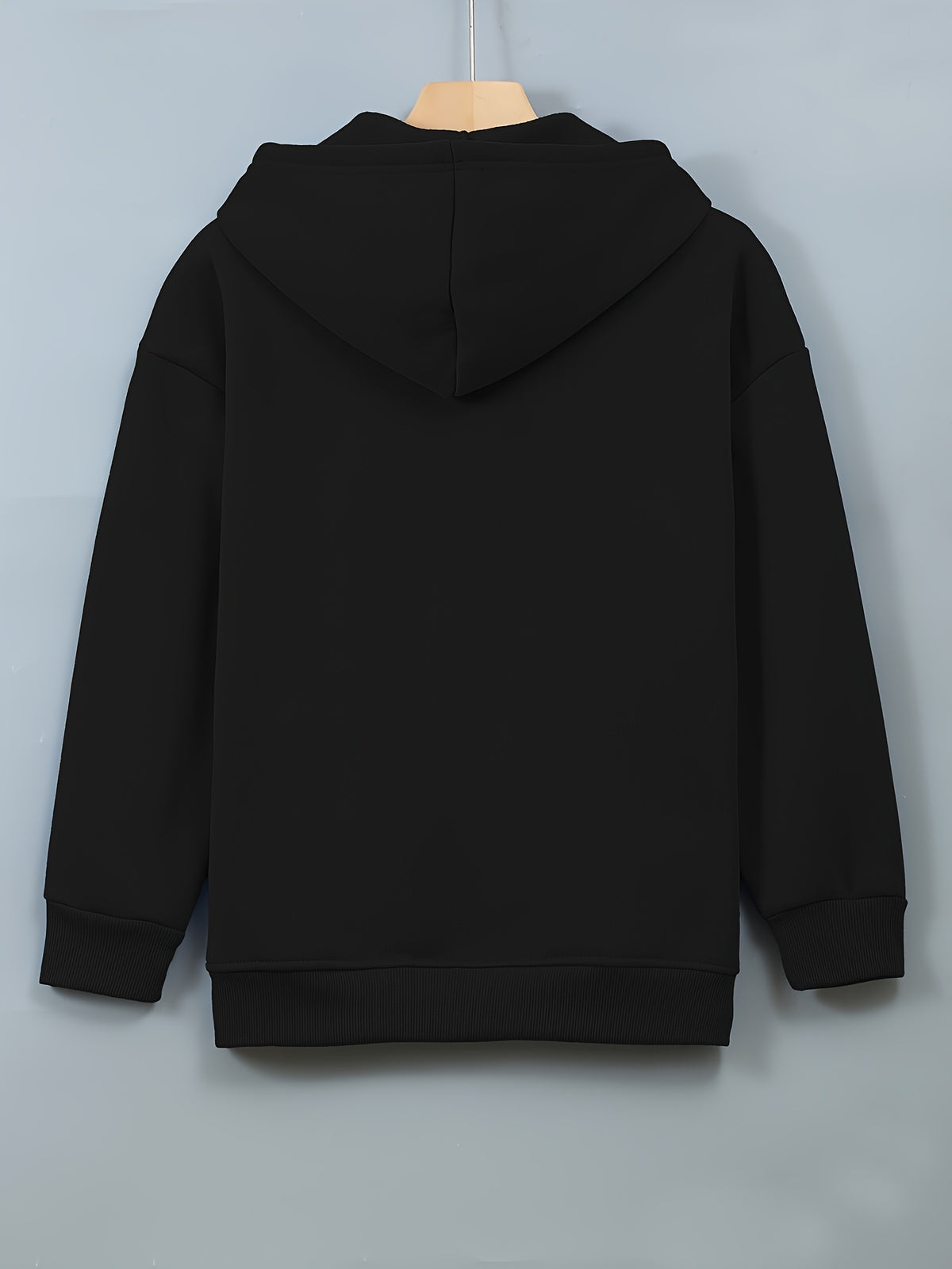 Veste grande taille, coupe ample, capuche, manches longues, détail du tissu