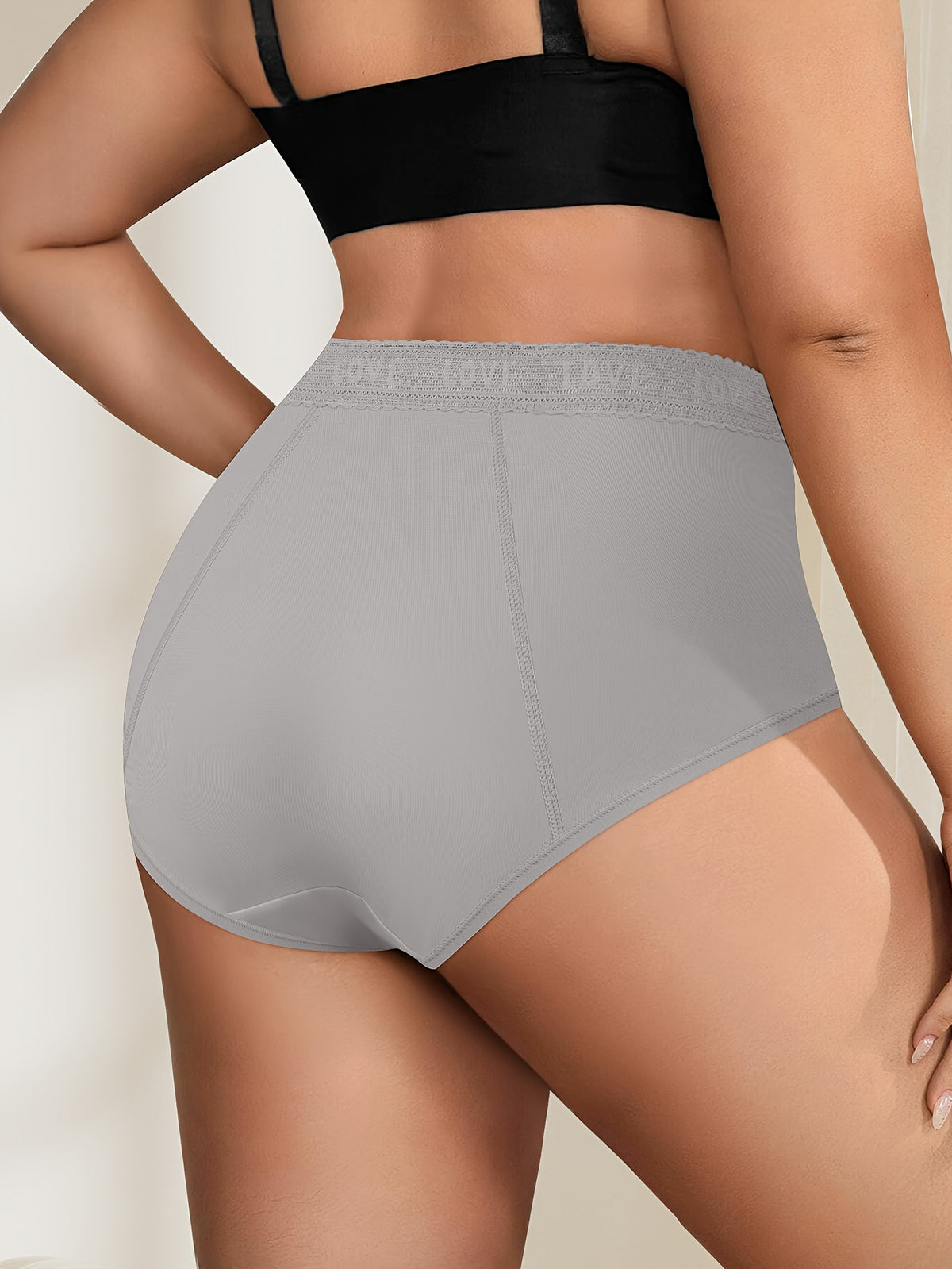 Culotte menstruelle grande taille en dentelle, coupe ajustée, effet ajouré, vu de dos