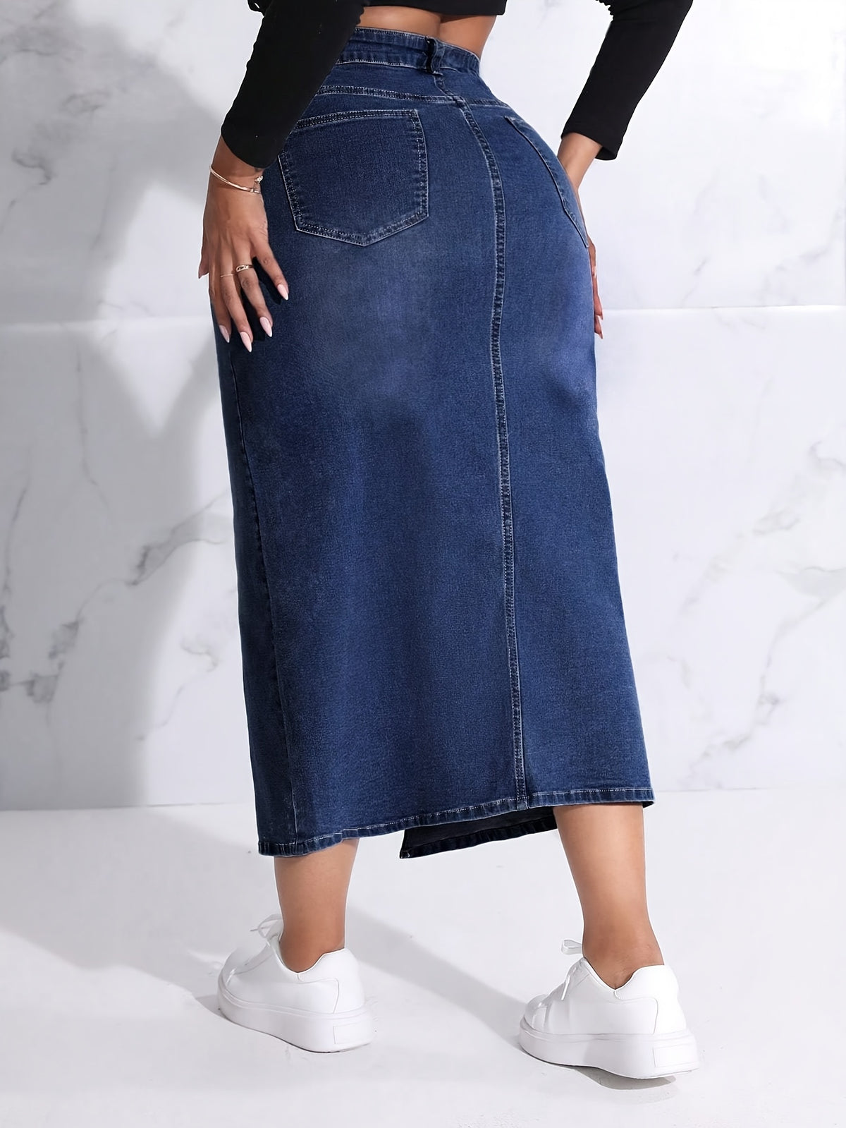 Jupe grande taille, coupe oversize, fermeture zippée, tenue franche, tissu opaque