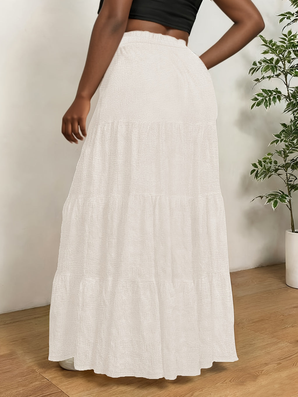 Jupe grande taille, coupe évasée, allure élégante, porté de face