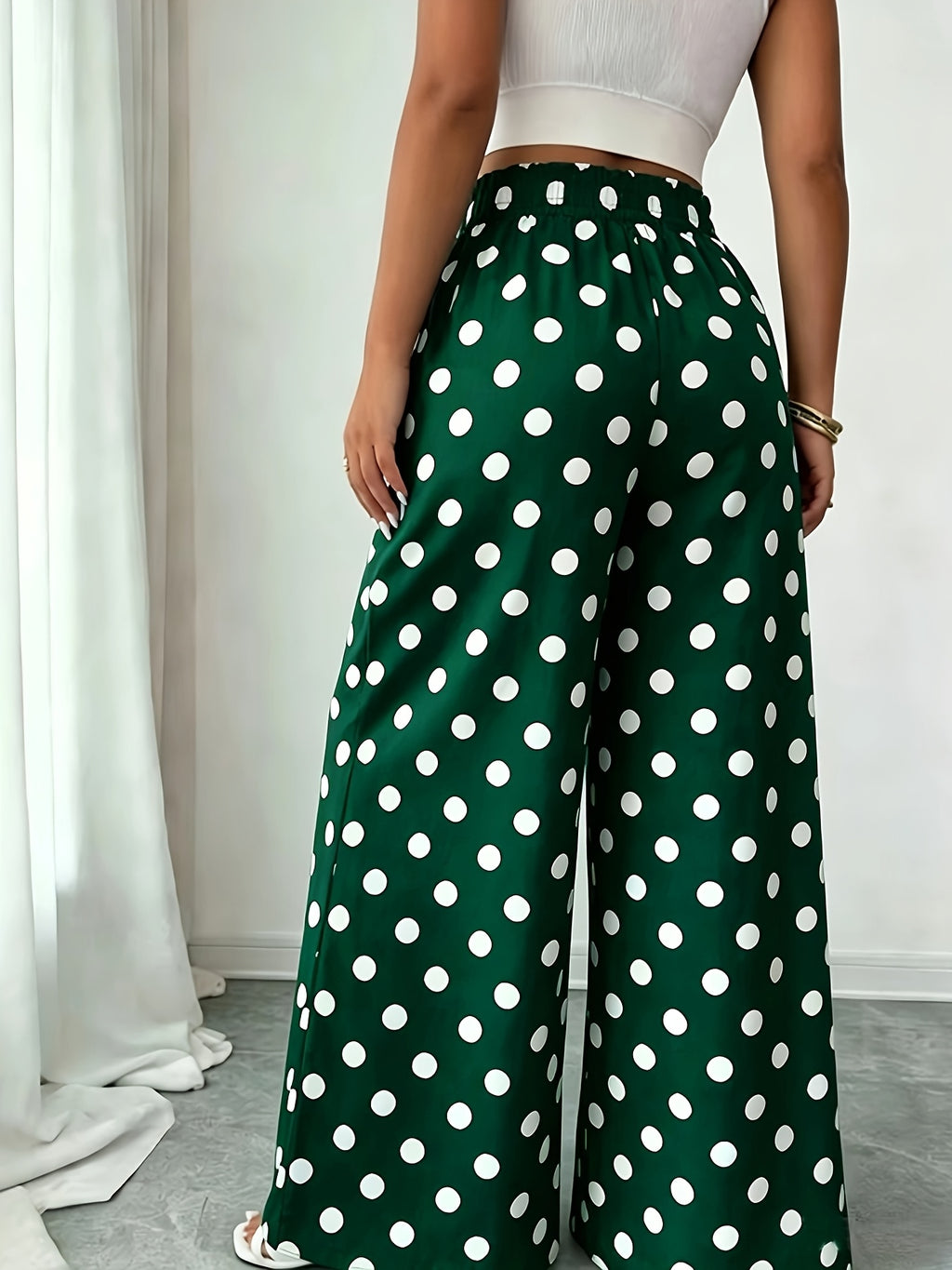Pantalon grande taille à pois, coupe évasée, visuel produit