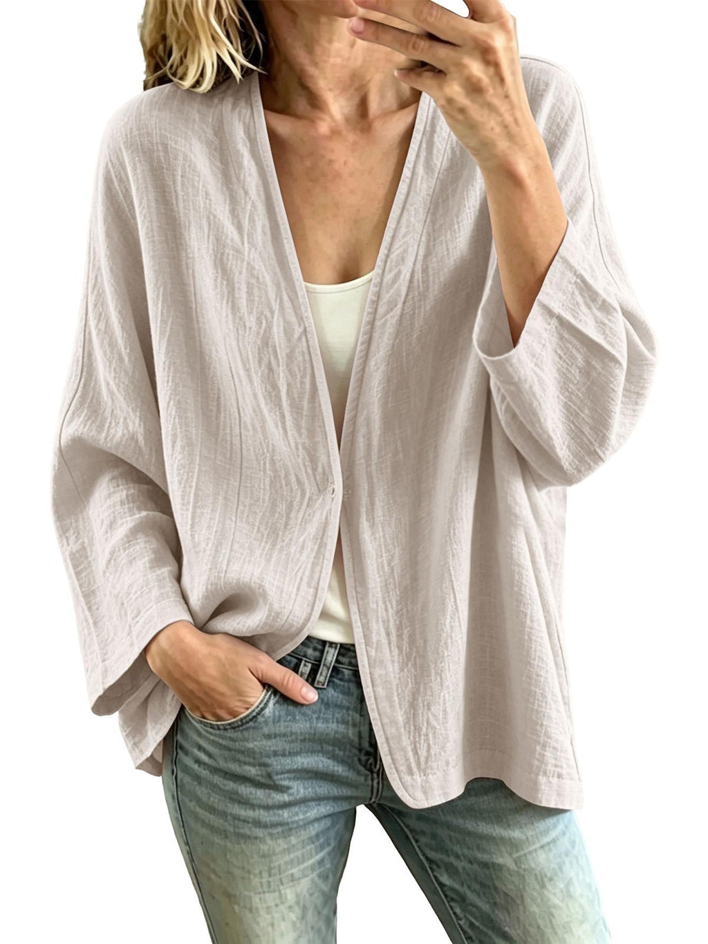 Veste grande taille en lin, coupe ample, encolure nette, manches longues, vu de dos