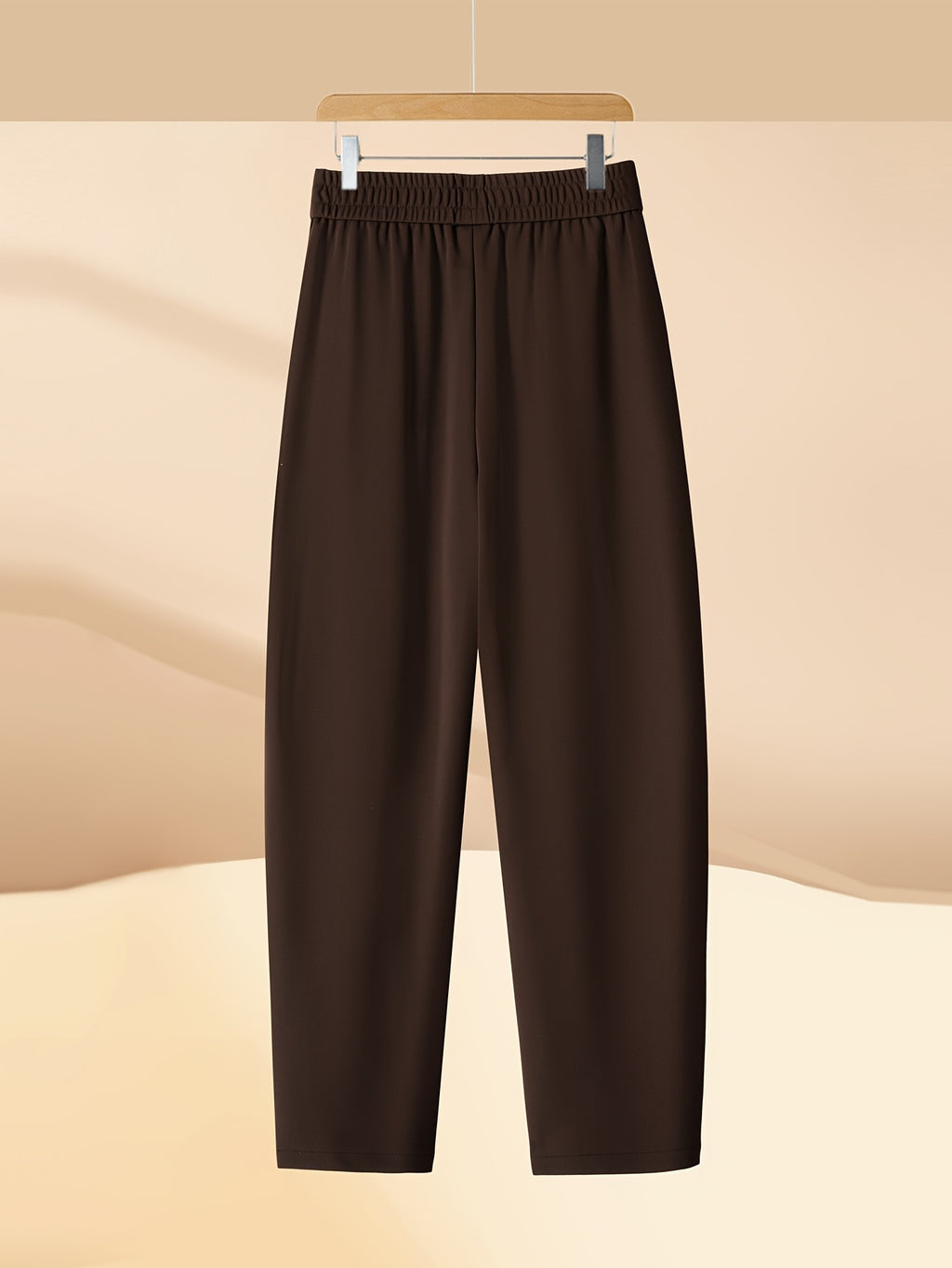 Pantalon carotte grande taille — Maille drapée et plis creux