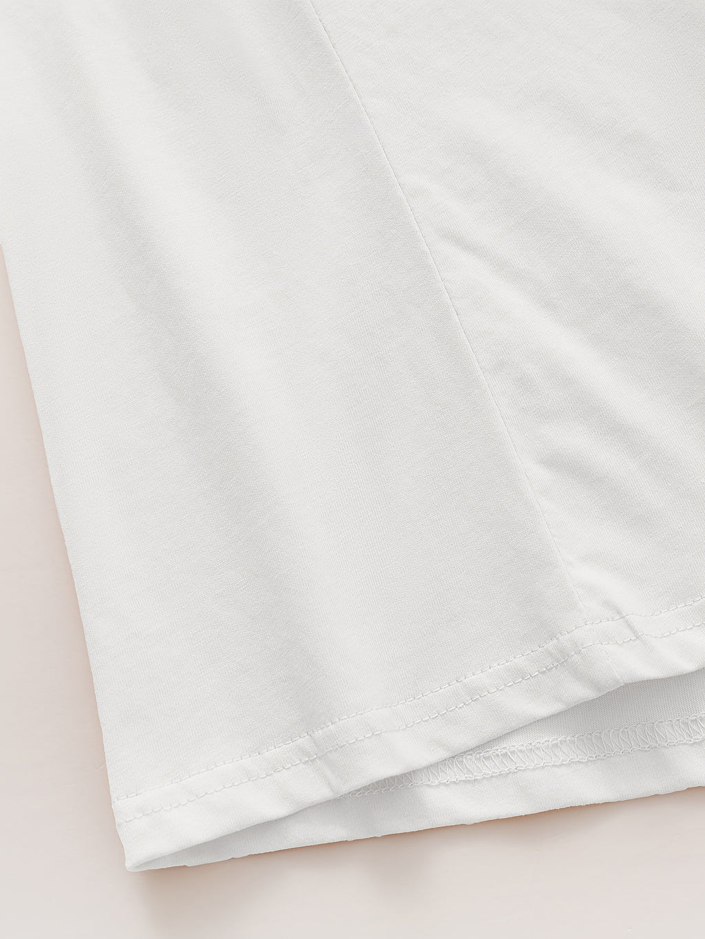 Top grande taille, col rond, manches longues, toucher naturel, mise en situation