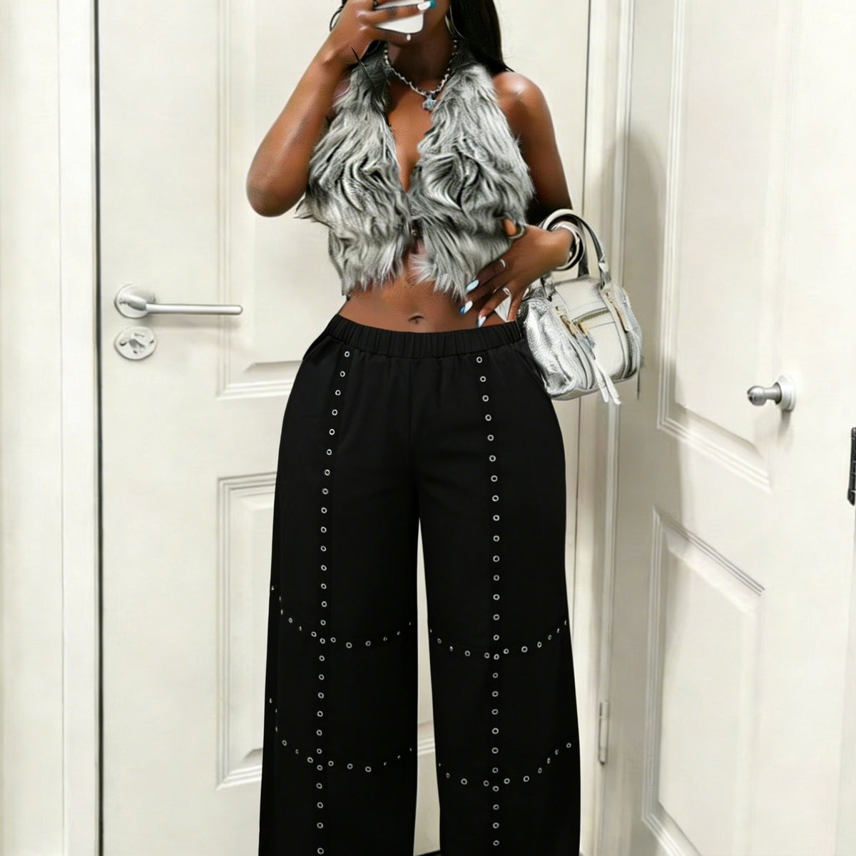 Pantalon grande taille, coupe évasée, poches pratiques, jambe droite — matière : polyester Image