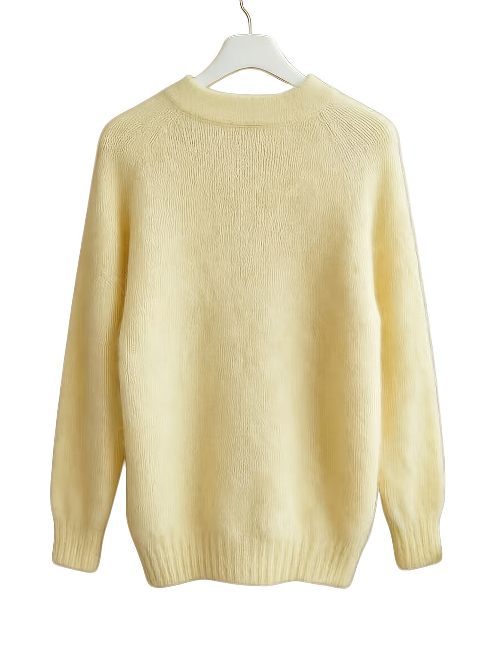 Top grande taille, coupe oversize, chaleur d'hiver, détail du col