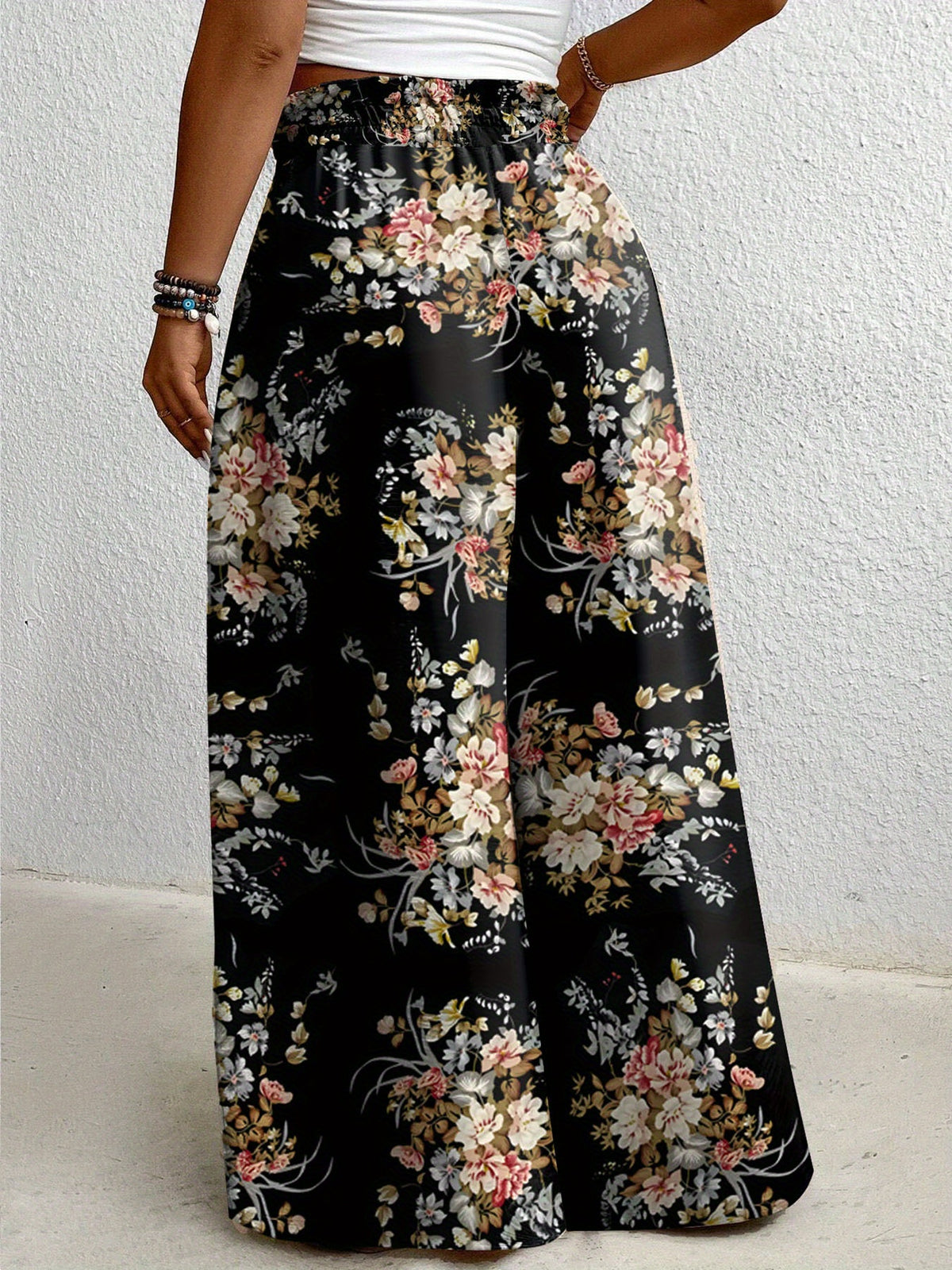 Pantalon grande taille à imprimé fleuri, coupe évasée, cordon — composition : 100% Polyester Image