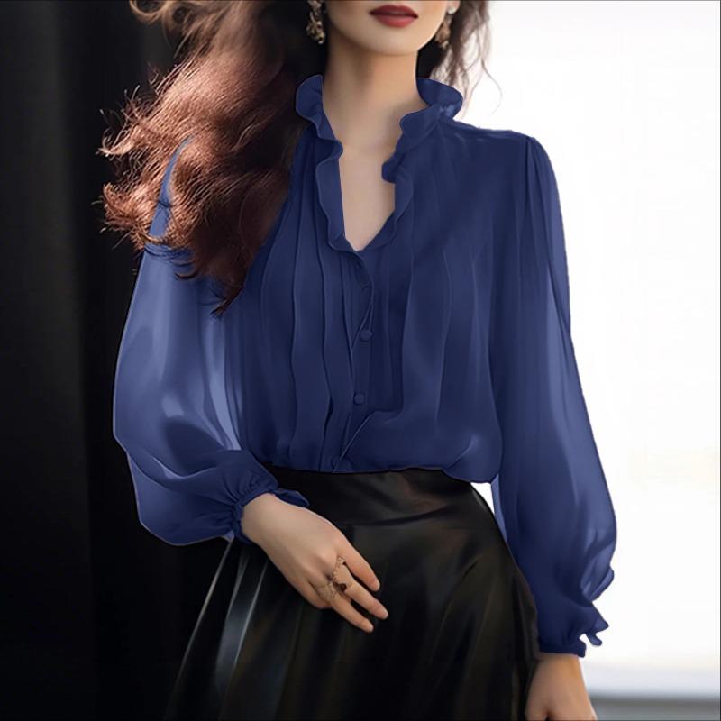 Top grande taille, coupe oversize, volants, manches longues — composition : 100% Polyester
