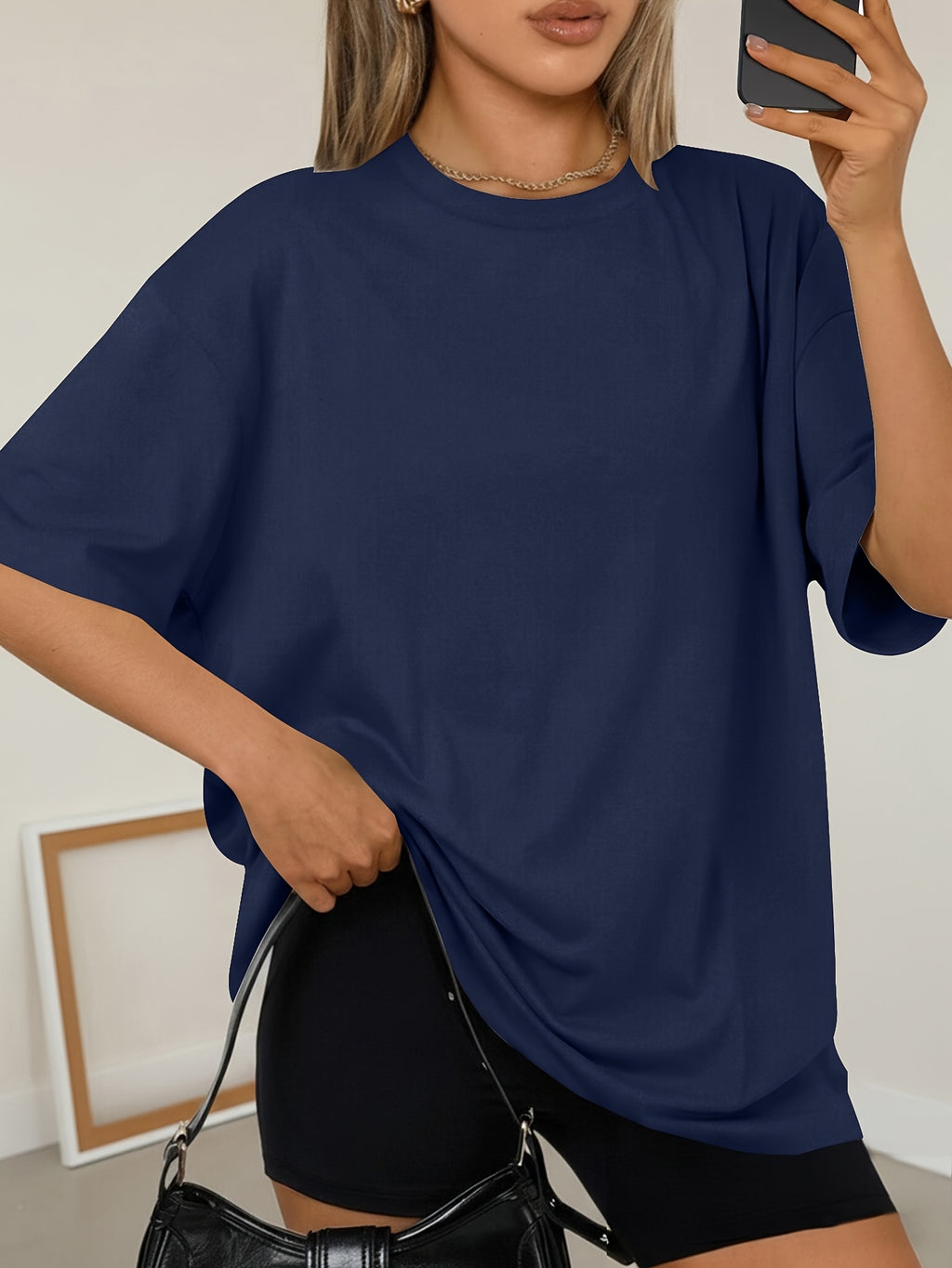 T-shirt grande taille, coupe ample, manches courtes, esprit sportif, mise en situation