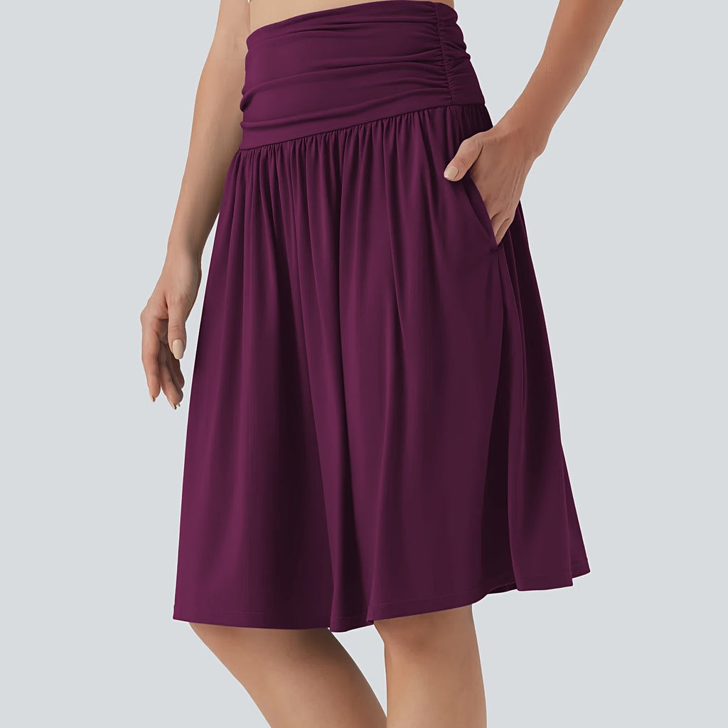 Jupe grande taille, coupe évasée, poches pratiques, tissu opaque