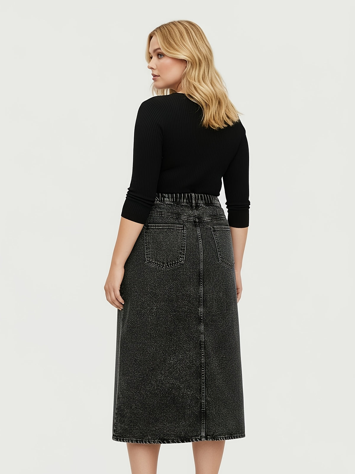 Jupe grande taille, fente, tenue franche, porté de face