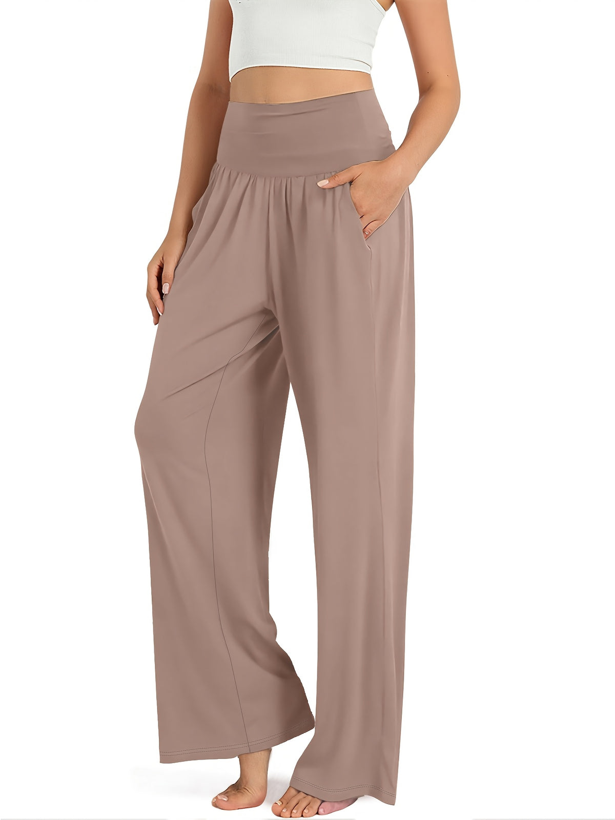 Pantalon grande taille, poches pratiques, tombé fluide, porté de face