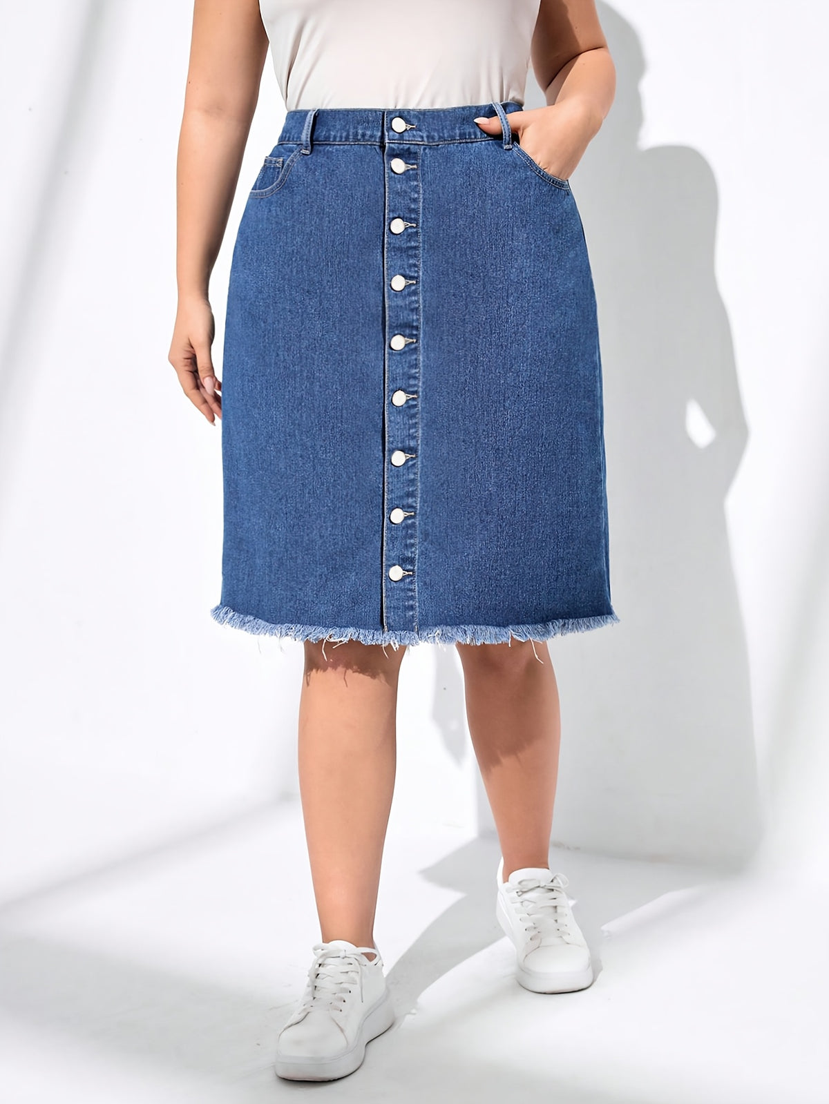 Jupe grande taille, coupe oversize, longueur genou, tenue franche Image