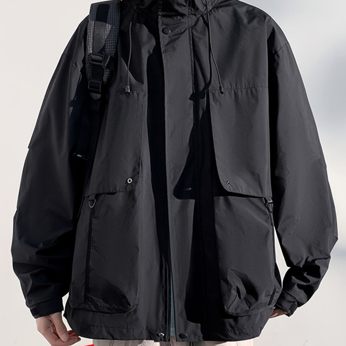Veste grande taille, coupe ample, épaules dénudées, poches pratiques, tissu opaque