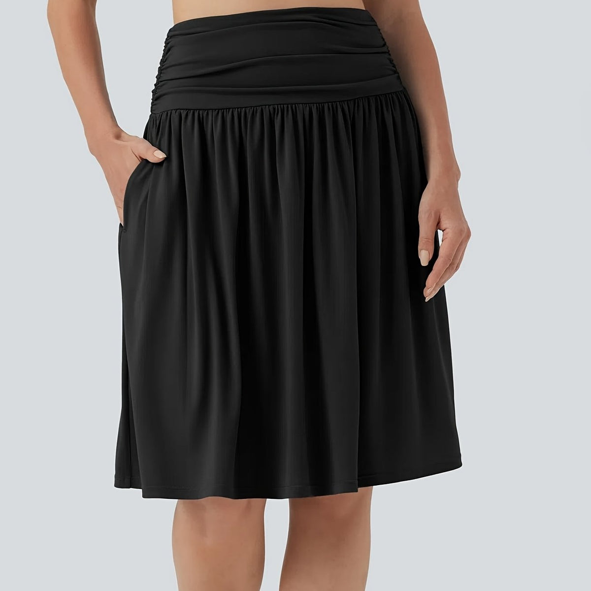 Jupe grande taille, coupe évasée, poches pratiques, porté de face