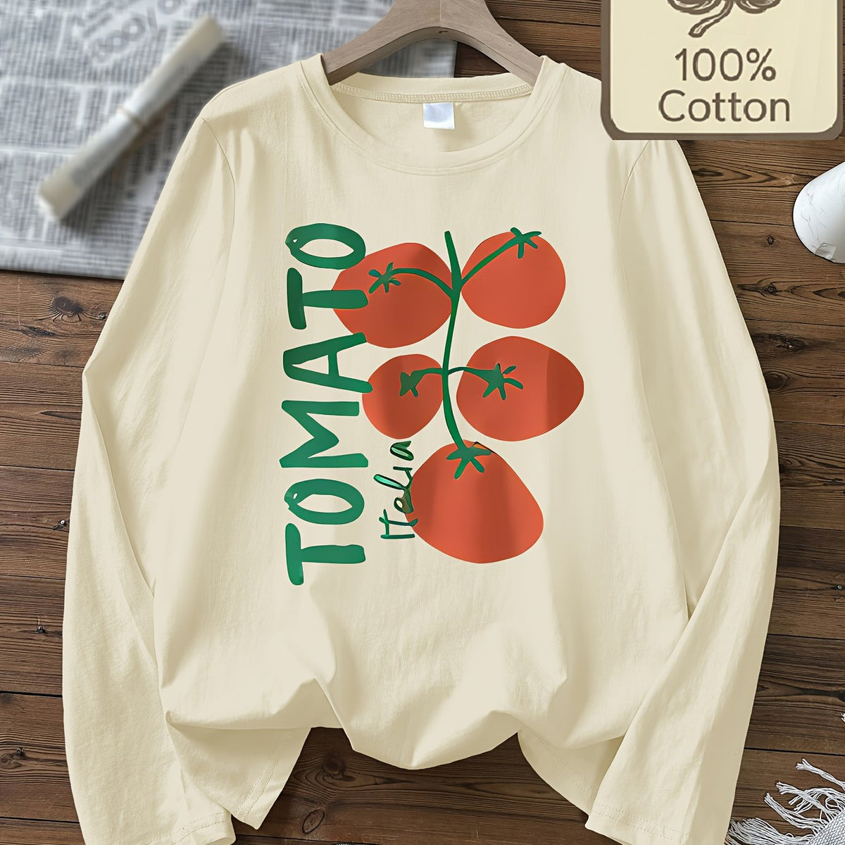 Top grande taille, col rond, manches longues, toucher naturel, détail du tissu