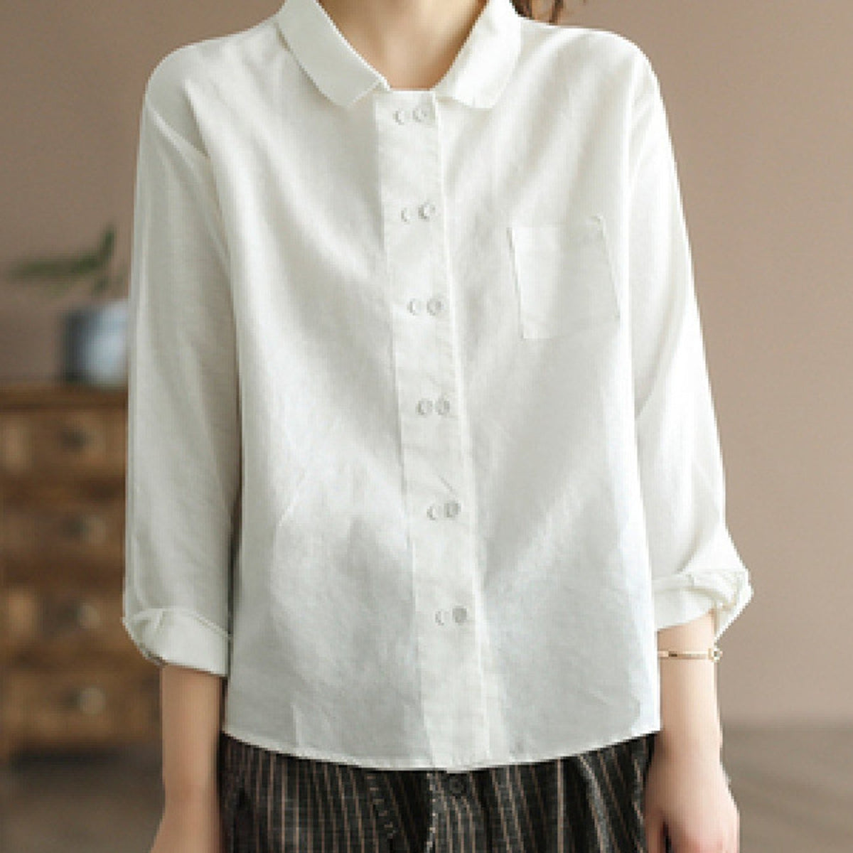 Chemise grande taille en lin, coupe ample, manches longues, tenue souple, tissu opaque