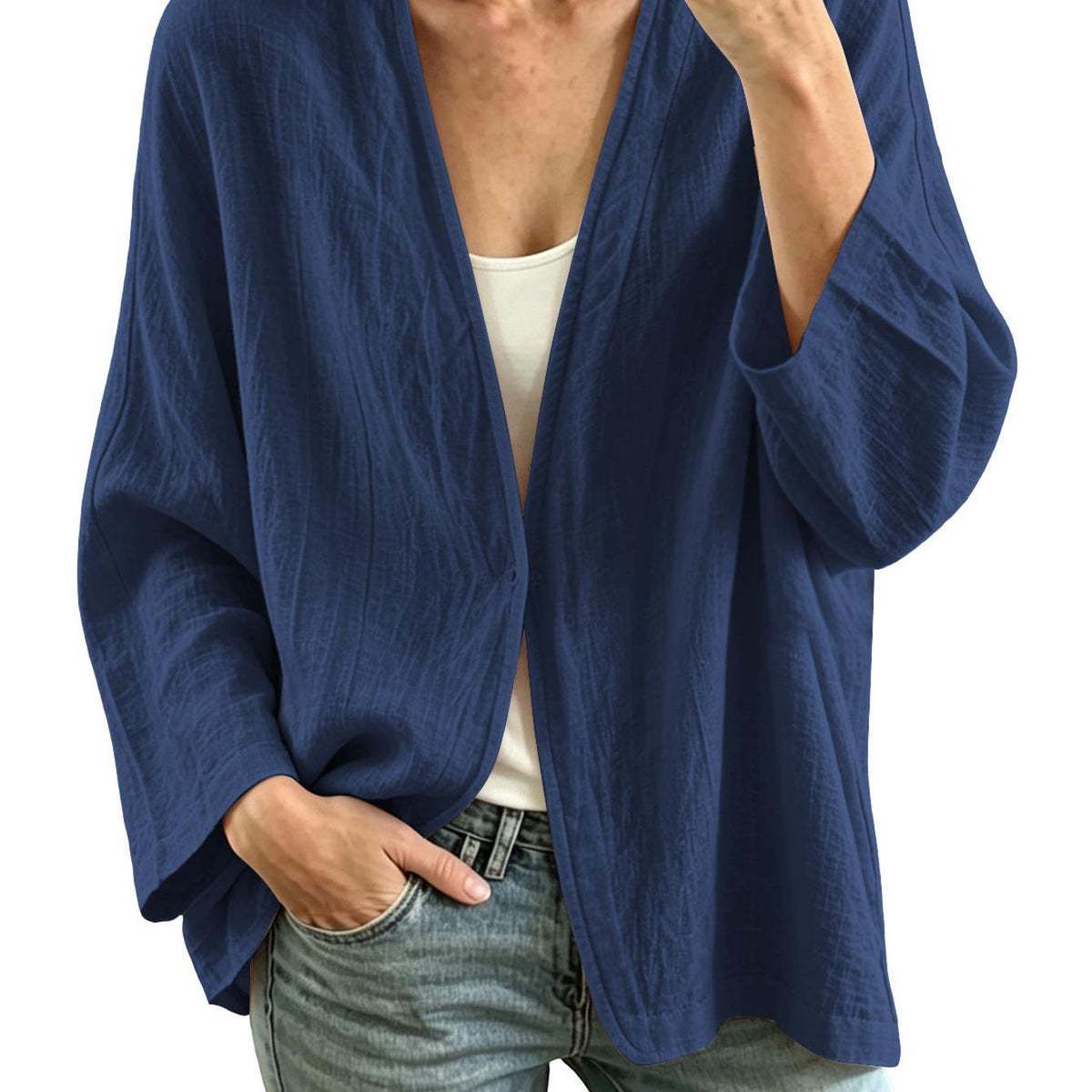 Veste grande taille en lin, coupe ample, encolure nette, manches longues