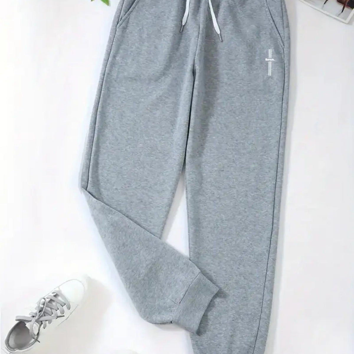 Pantalon grande taille, poches pratiques — composition : 100% Polyester