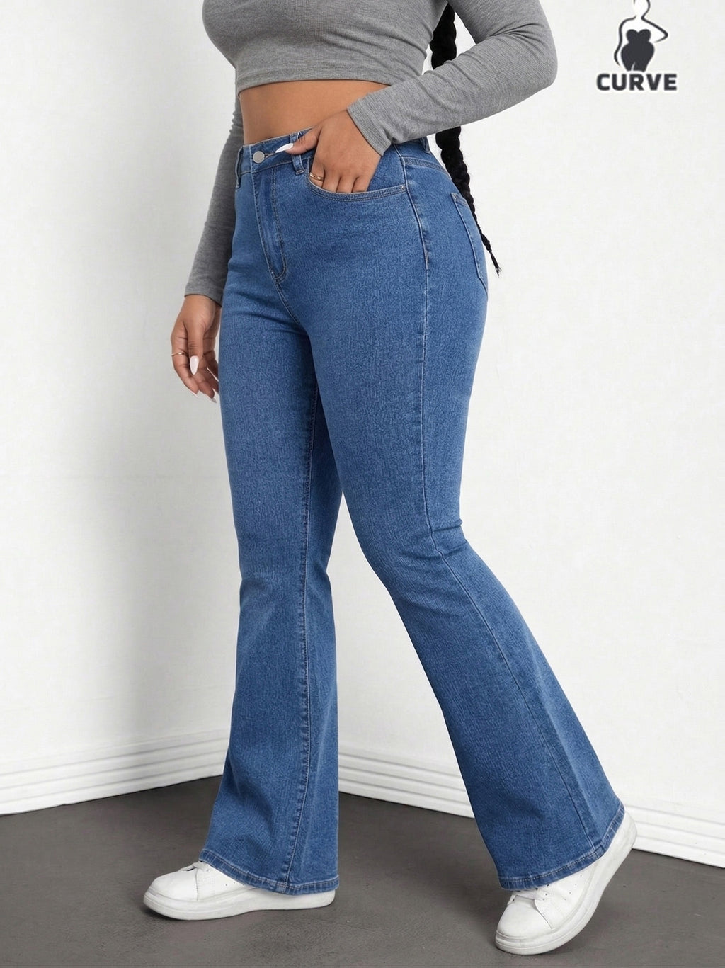 Jean grande taille, coupe évasée, tenue franche, forte élasticité