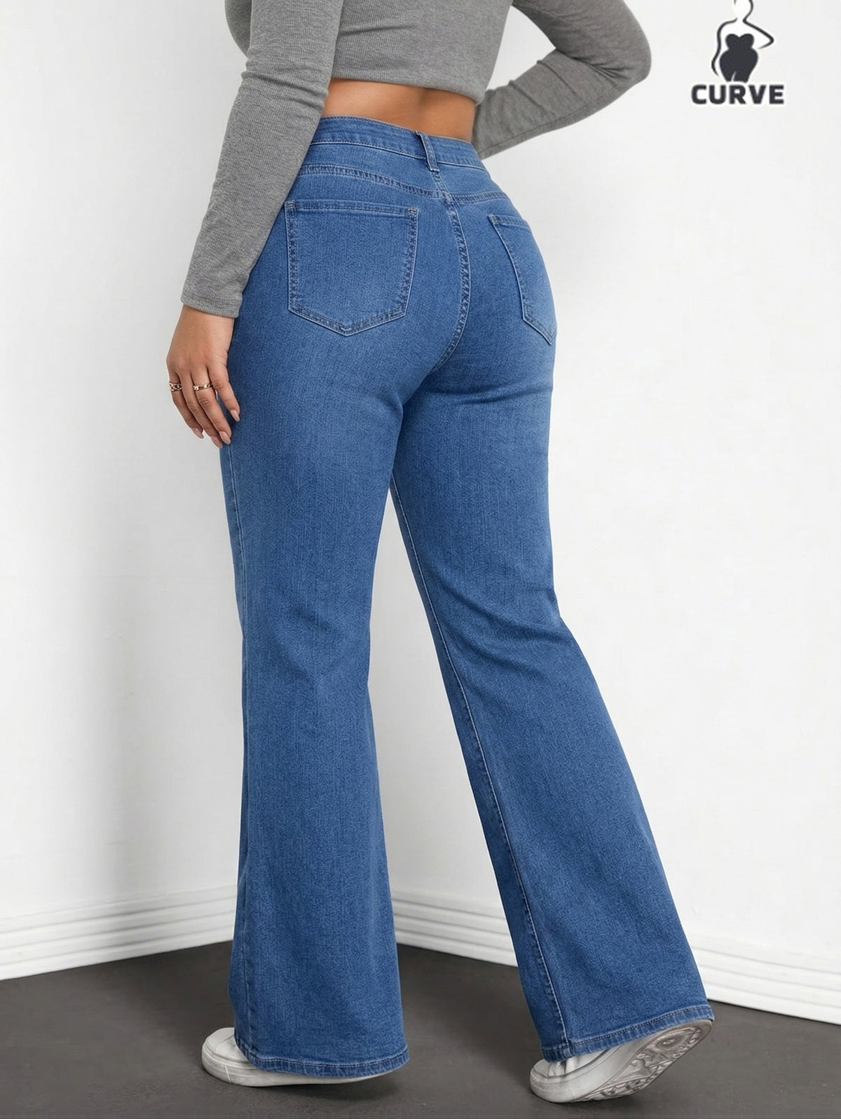 Jean grande taille, coupe évasée, tenue franche, forte élasticité