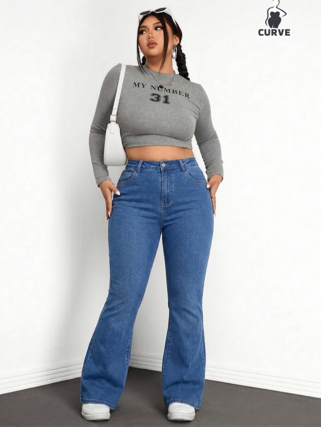 Jean grande taille, coupe évasée, tenue franche, forte élasticité