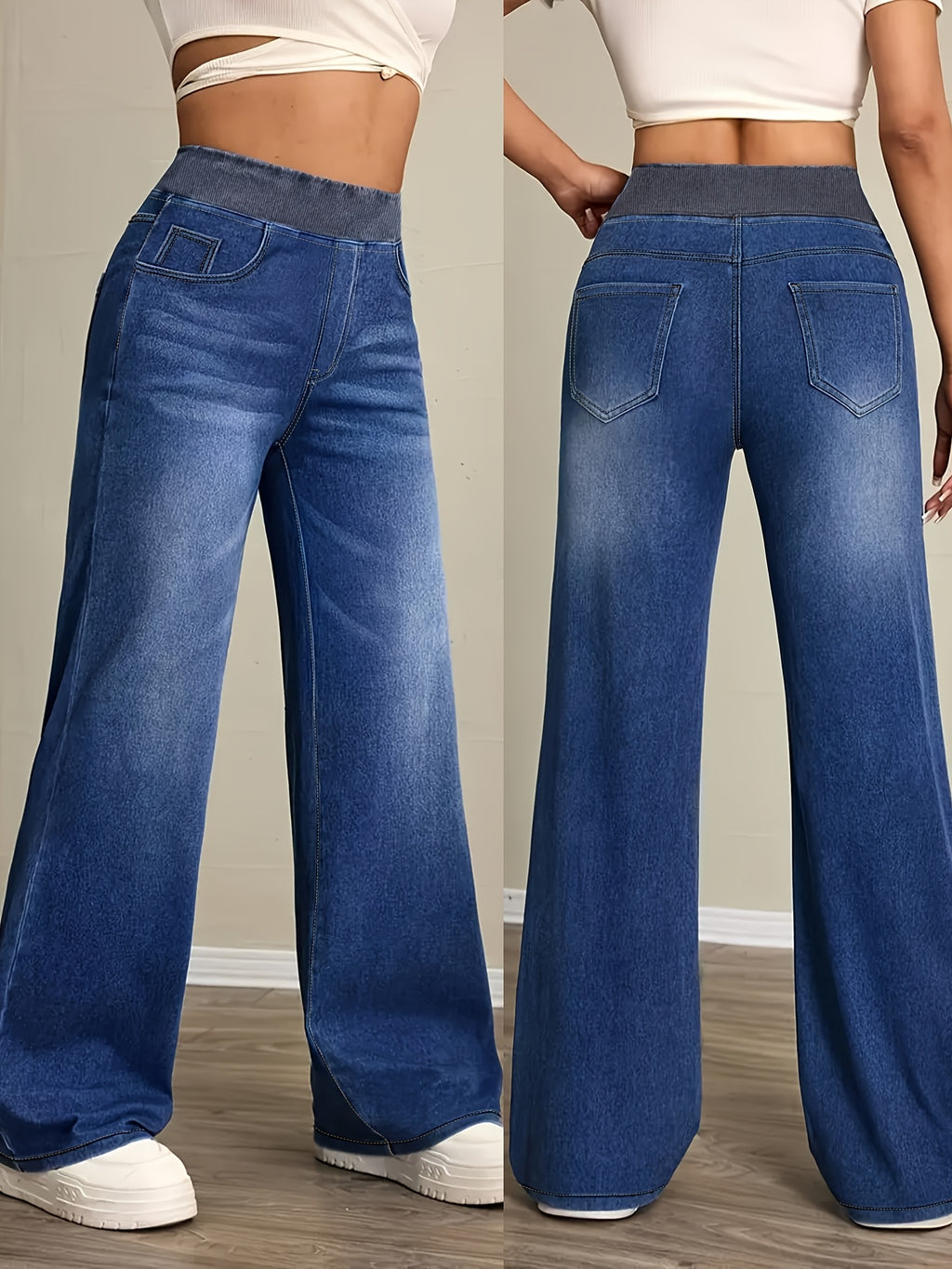 Jean grande taille, coupe évasée, délavage doux, poches pratiques, porté de face