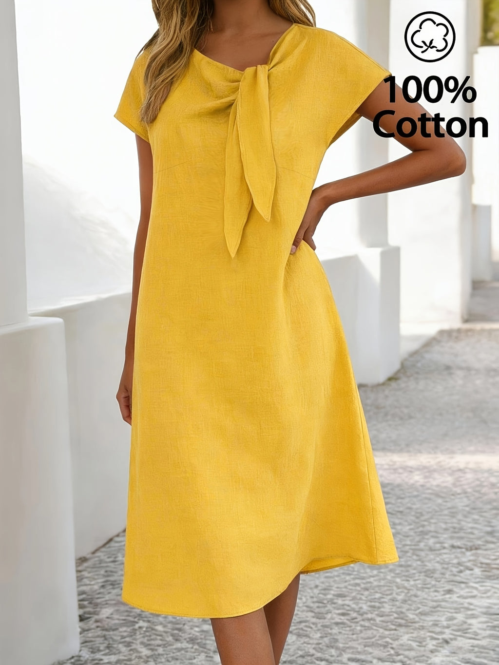 Robe jaune grande taille — Encolure oblique nouée à poches