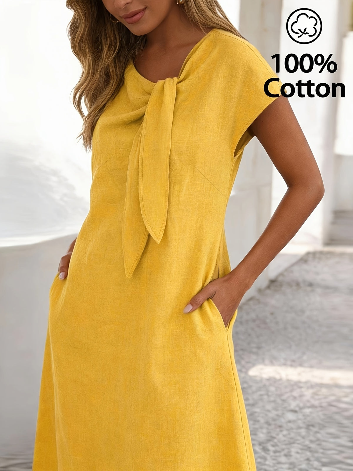 Robe jaune grande taille — Encolure oblique nouée à poches