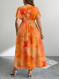 Robe longue grande taille — Voile fluide à grands lys orangés